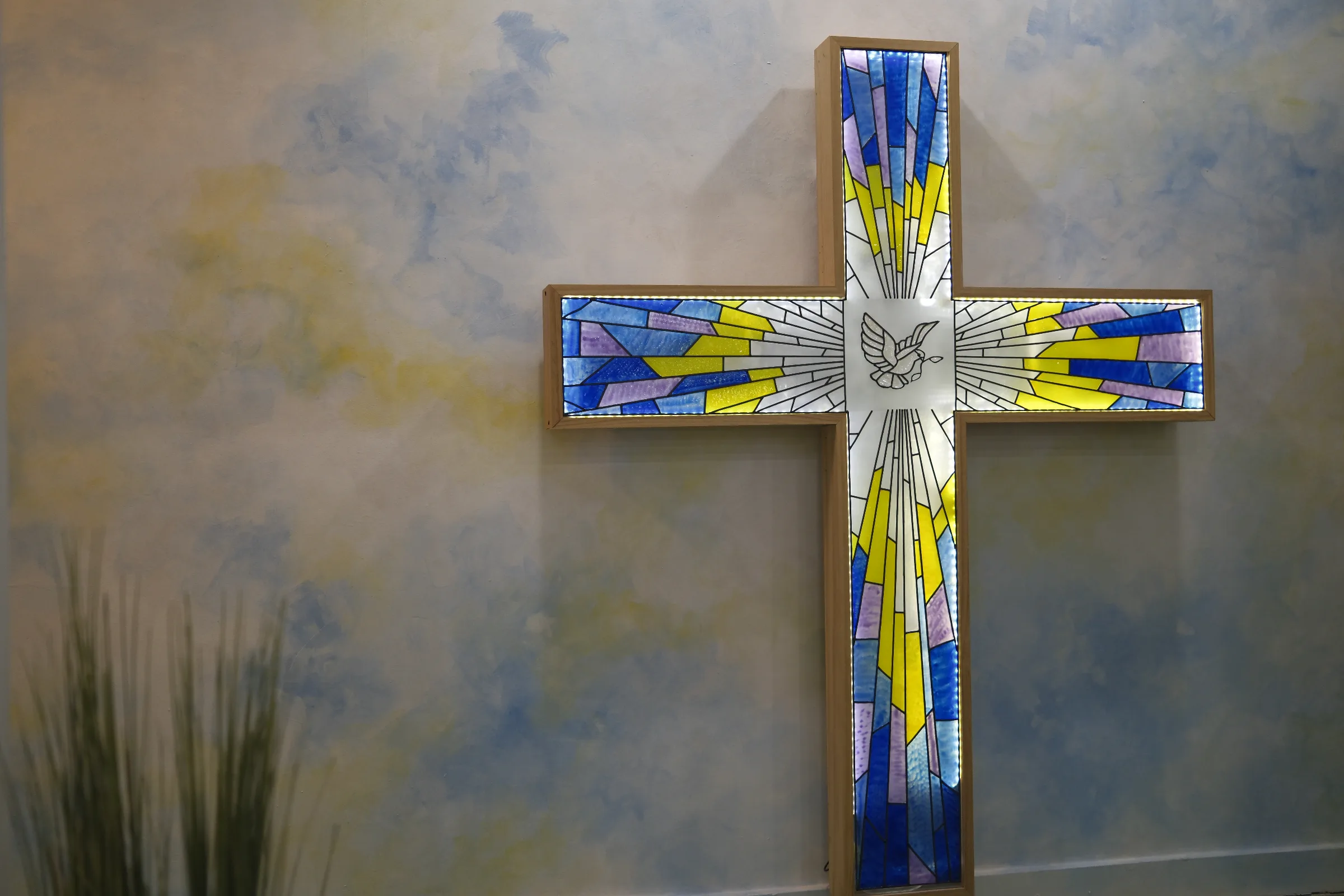 View of the church cross over top of the baptistry